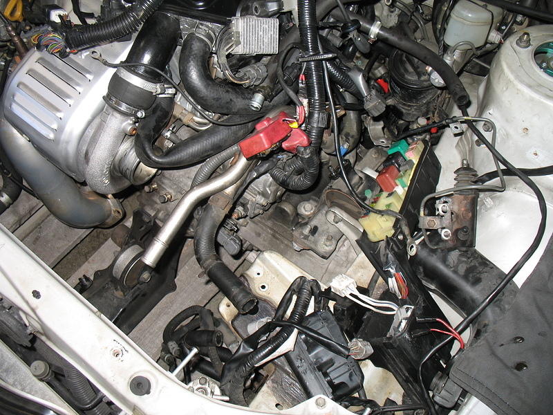 the chaotic engine bay from another angle