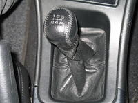 In 1st gear with handbrake up